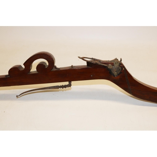 255 - C19th Continental pellet crossbow, hardwood stock with engraved steel fittings, L100cm