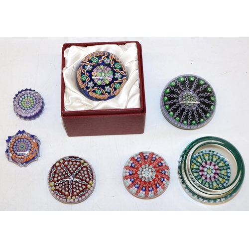 416 - Group of seven Perthshire millefiori glass paperweights, six with signature central 'P' cane, one in... 