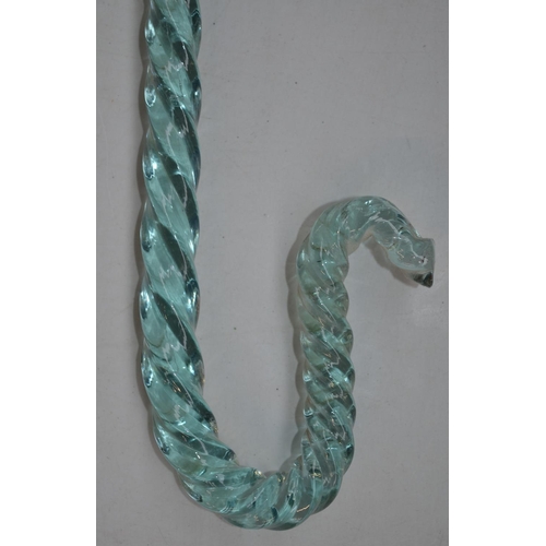 699 - Spiral pattern light blue glass cane, length 137cm