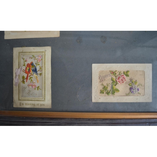 702 - Framed collection of World War 1 postcards to include 8 embroidered silk examples and 2 bouquet card... 