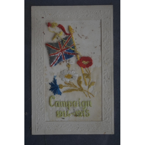 702 - Framed collection of World War 1 postcards to include 8 embroidered silk examples and 2 bouquet card... 