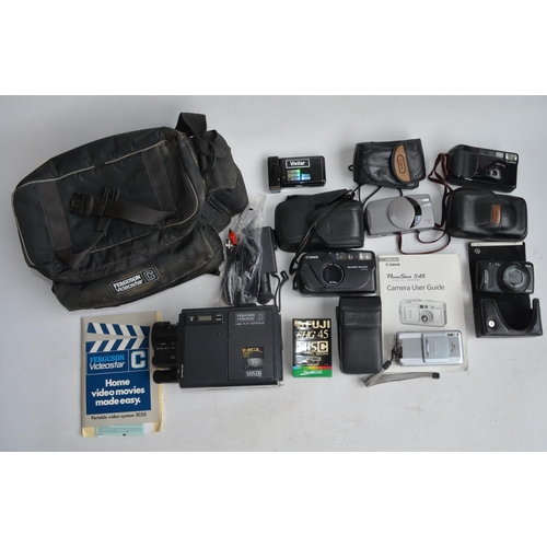 703 - Collection of 35mm SLR cameras and accessories to include Canon A-1 with Canon 28mm and 50mm lenses,... 