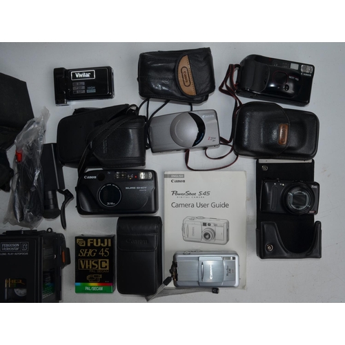 703 - Collection of 35mm SLR cameras and accessories to include Canon A-1 with Canon 28mm and 50mm lenses,... 