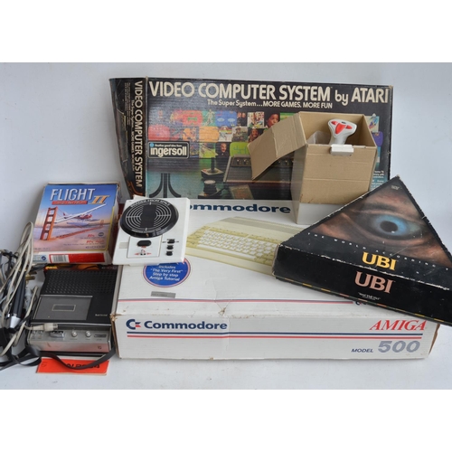 708 - Boxed Commodore Amiga Model 500, an Atari Video Computer System (controllers and game instructions b... 