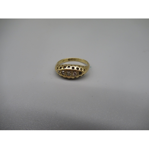 610 - 18ct yellow gold rub over ring, missing one diamond, stamped 18ct, size G, 2.4g, 2.7g