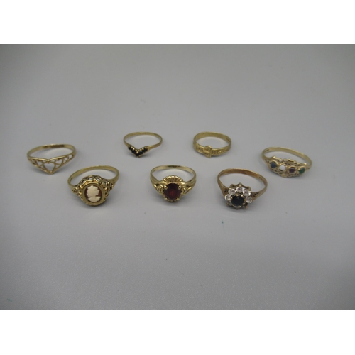 615 - Six 9ct yellow gold rings including a cameo ring, a clear stone and sapphire cluster ring, 9.1g, and... 