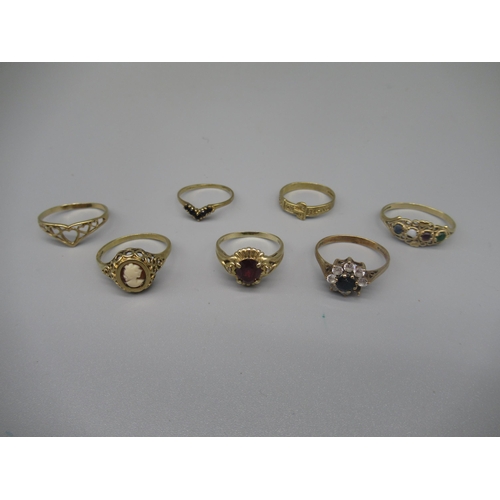 615 - Six 9ct yellow gold rings including a cameo ring, a clear stone and sapphire cluster ring, 9.1g, and... 