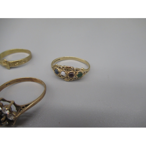 615 - Six 9ct yellow gold rings including a cameo ring, a clear stone and sapphire cluster ring, 9.1g, and... 