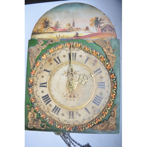 654 - Dutch wall clock with three figural finials above arched dial painted with a rural scene, H140cm. Al... 