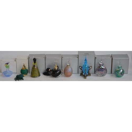 690 - 22 boxed decorative glass perfume bottles, all complete to include Glass Act Studios examples