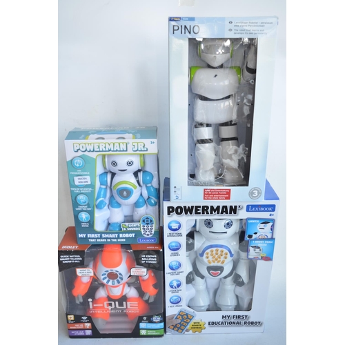 712 - Four boxed electronic robot figures to include a Lexibook Powerman First Educational Robot and Power... 