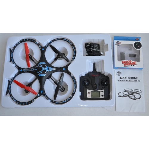 713 - Collection of boxed radio controlled helicopters, drones and cars to include 6 axis gyro stabilised ... 