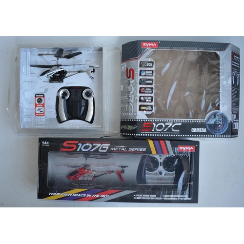 713 - Collection of boxed radio controlled helicopters, drones and cars to include 6 axis gyro stabilised ... 