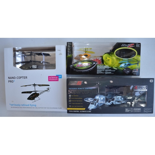 713 - Collection of boxed radio controlled helicopters, drones and cars to include 6 axis gyro stabilised ... 