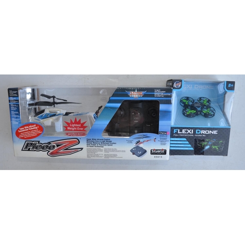 713 - Collection of boxed radio controlled helicopters, drones and cars to include 6 axis gyro stabilised ... 