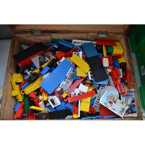 718 - Large collection of previously used Lego and Lego Duplo including set instructions