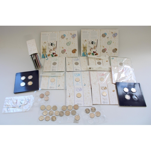 61 - Collection of Royal Mint UNC Beatrix Potter 150th anniversary 50p coin packs together with Beatrix P... 