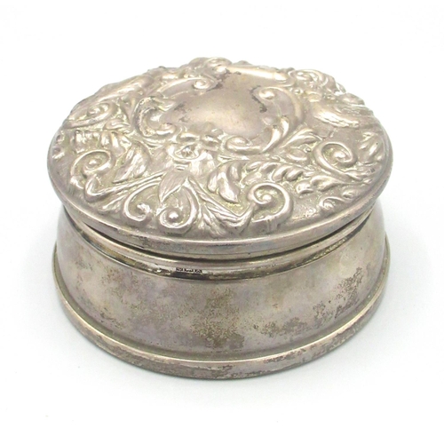 1240 - ER.II circular hallmarked silver cylindrical jewel box by Broadway & Co., Birmingham 1972, repousse ... 