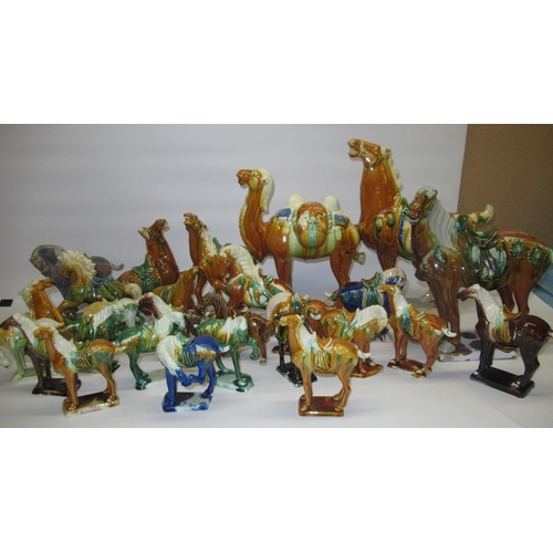 85 - Large collection of C20th Chinese sancai glaze Tang style horse and camel figurines, max H36cm