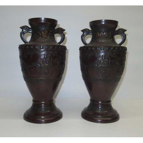 87 - C20th pair of Chinese bronze vases of inverted baluster shape decorated in relief with travelling no... 