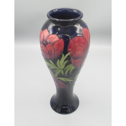 201 - Moorcroft Pottery: Anemone pattern tall baluster vase, tube lined with red and purple flowers on dar... 