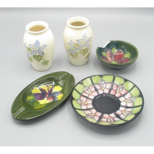 206 - Moorcroft Pottery: pair of Campanula pattern vases, H11cm; a Violet pattern saucer; Hibiscus ashtray... 