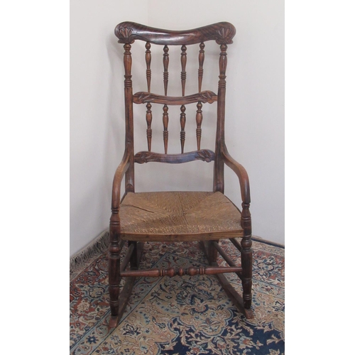 747 - Victorian painted as rosewood rocking chair, with dished top rail, spindled turned back and rush sea... 