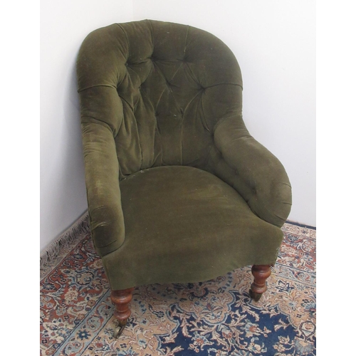 742 - Victorian upholstered armchair with deep buttoned spoon back and serpentine seat on turned supports ... 