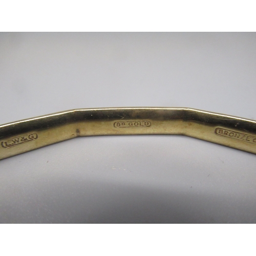 607 - LW&G Lagarmic 9ct gold bronze core bangle, with Greek Key design, stamped 9c