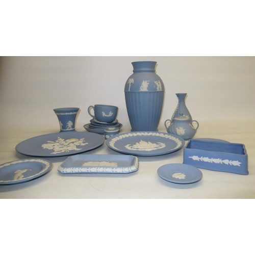 92 - Wedgwood pale blue jasperware vase, H25cm, other Wedgwood jasperware plates, dishes, cups etc. (qty)