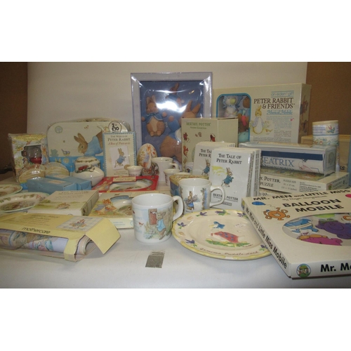 98 - Large collection of Beatrix Potter Peter Rabbit related childrens items incl. books, briefcase, mugs... 