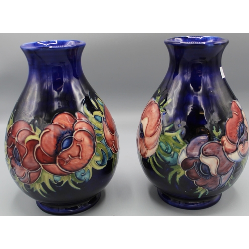 194 - Moorcroft Pottery: pair of Anemone pattern ovoid vases with flaring necks, tube lined with pink to p... 