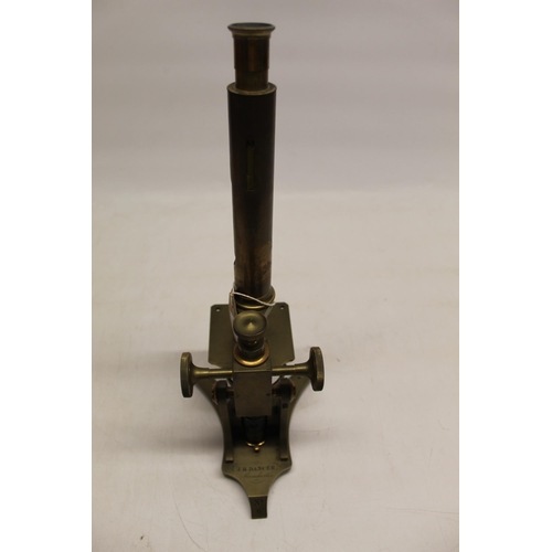 220 - J.B. Dancer Manchester - C19th brass microscope on triform foot with engraved maker and numbered 6, ... 