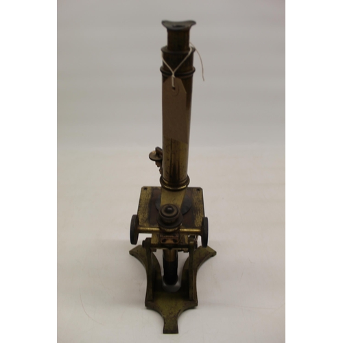 221 - C19th lacquered brass microscope on triform base, no visible maker, H37cm