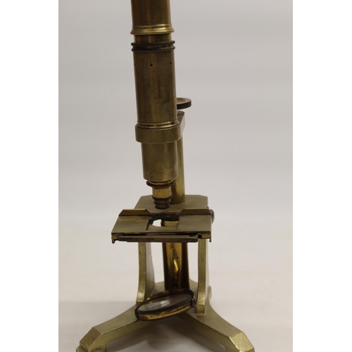 222 - J.B. Dancer Manchester - C19th lacquered brass microscope on cast triform base bearing makers mark, ... 