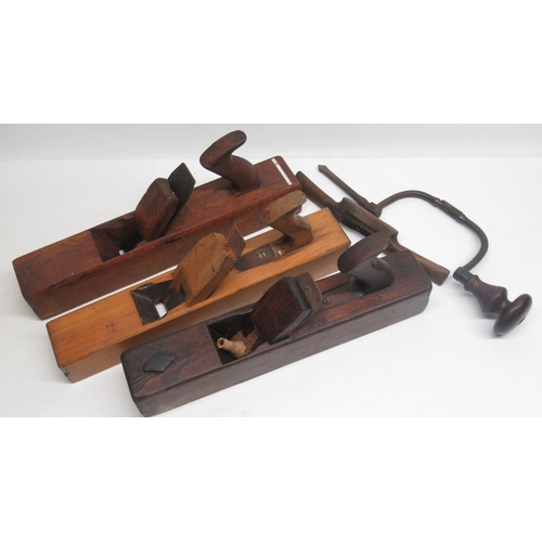 264 - Three beech carpenter's jack planes, brace and bit and a wooden spoke shave (5)