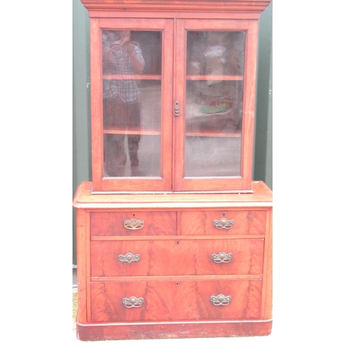 744 - Victorian mahogany cupboard on chest, with two glazed doors above two short and two long curl veneer... 