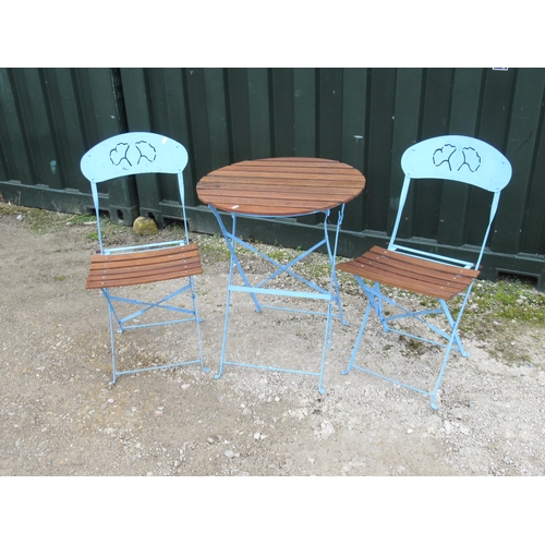 757 - Patio style folding table and chairs, with wooden slat top and blue painted folding frames (3)