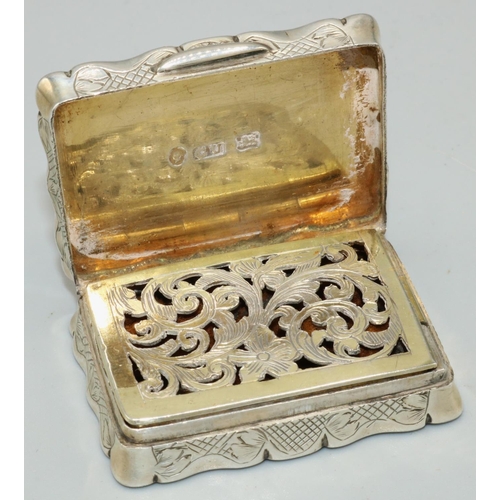 47 - Victorian hallmarked silver shaped rectangular vinaigrette, hinged cover with a scroll cartouche on ... 