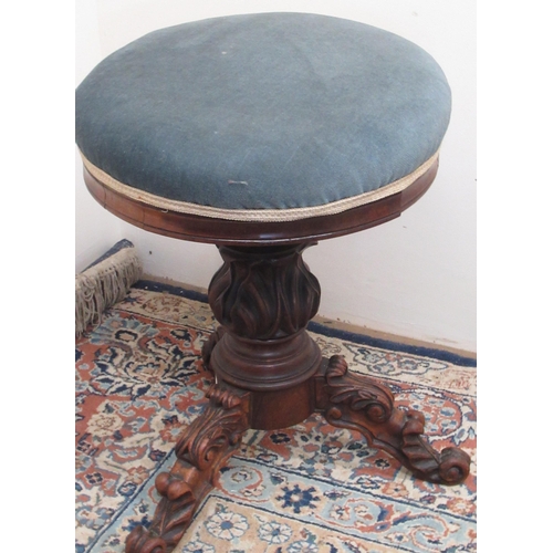 784 - Victorian adjustable piano stool, circular upholstered top on three carved outsplayed legs