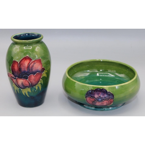 209 - Moorcroft Pottery: Anemone pattern footed bowl, tube lined with red/purple flowers on green ground, ... 