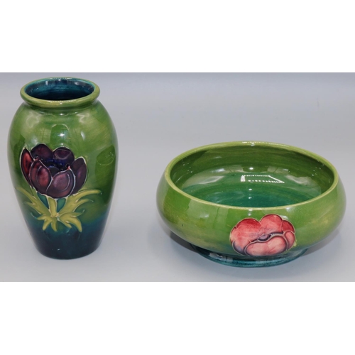 209 - Moorcroft Pottery: Anemone pattern footed bowl, tube lined with red/purple flowers on green ground, ... 