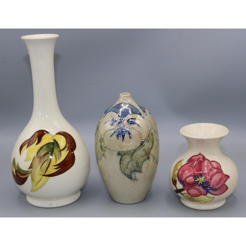 213 - Moorcroft Pottery: Magnolia pattern vase, H9cm; autumn leaf design vase with Queen Mary sticker, H21... 