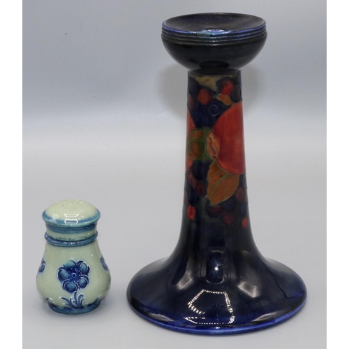 214 - Moorcroft Pottery: Pomegranate pattern candlestick, A/F - repair to rim, H16.5cm; and a William Moor... 