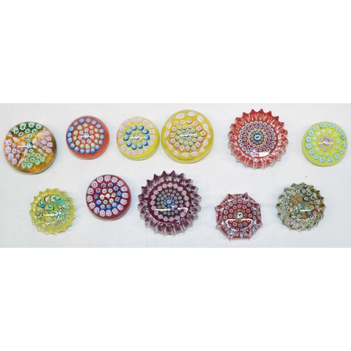 400 - Eleven John Deacons millefiori paperweights, seven with signature thistle cane, two with stag detail... 