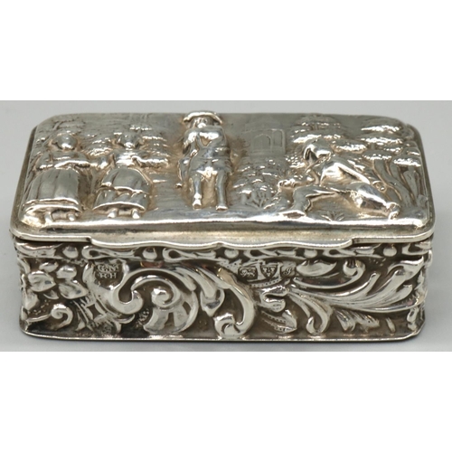 1203 - Edward VII hallmarked silver rectangular snuff box, all over repousse decorated, hinged lid with fig... 