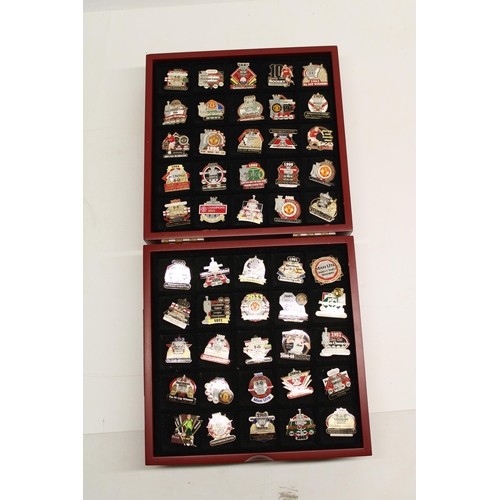 108 - Manchester United Victory Pin collection of 50 enamel badges with certificates in presentation case