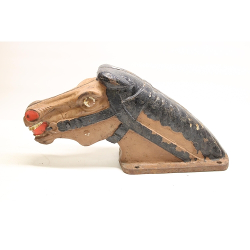 122 - Early C20th cast iron painted horses head children's playground ride or fairground adornment, L55cm