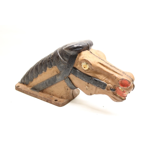 122 - Early C20th cast iron painted horses head children's playground ride or fairground adornment, L55cm