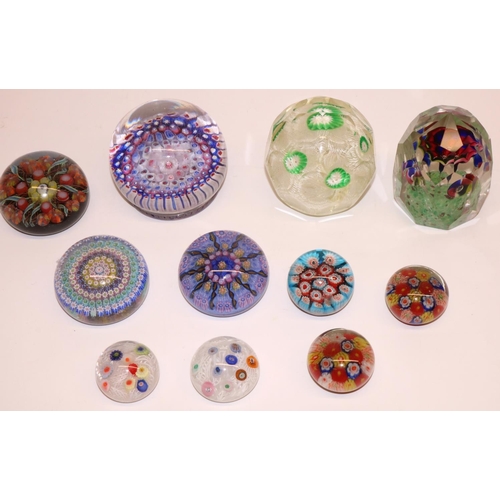 1234 - Collection of mid-late C20th glass paperweights, predominantly millefiori, including one with a foot... 